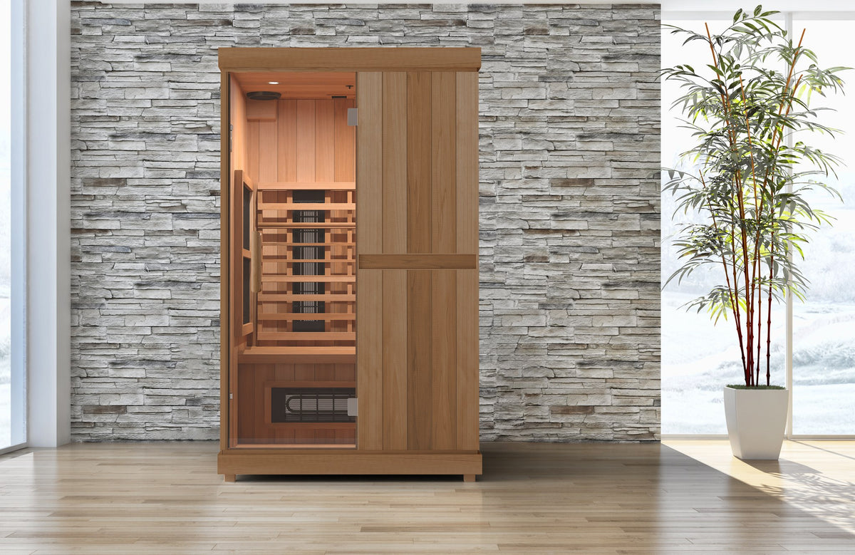 Finnmark FD-2 2-person infrared sauna, against a stone wall